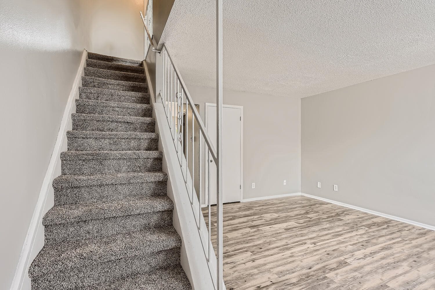 Alder Square Living Room with stairs Alder Square Living Room with stairs